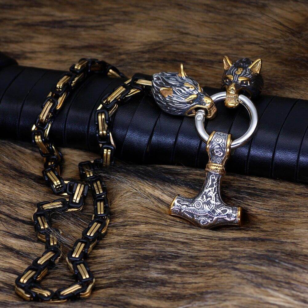 Gold And Black Trimmed King Chain With Wolves Biting The Ring Holding A Mjolnir Pendant