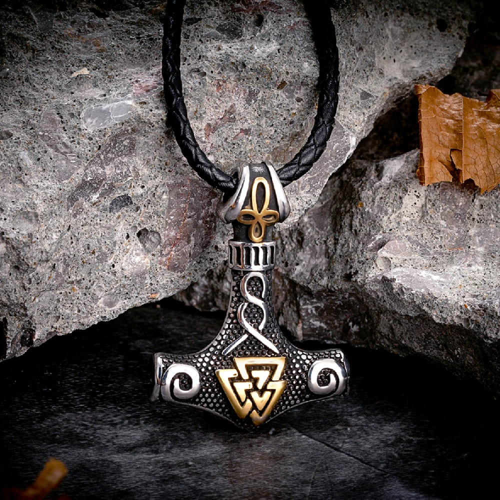 Thor Hammer Necklace on a Rock