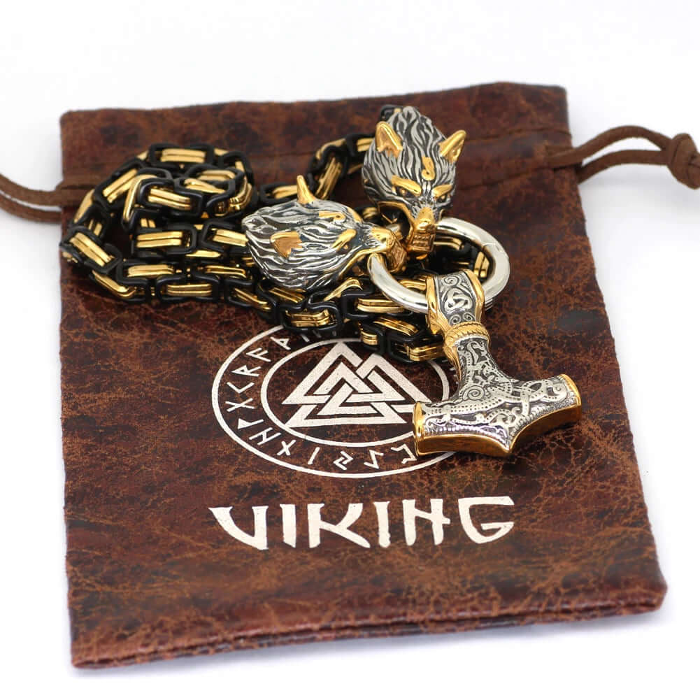 Gold And Black Trimmed King Chain With Wolves Biting The Ring Holding A Mjolnir Pendant